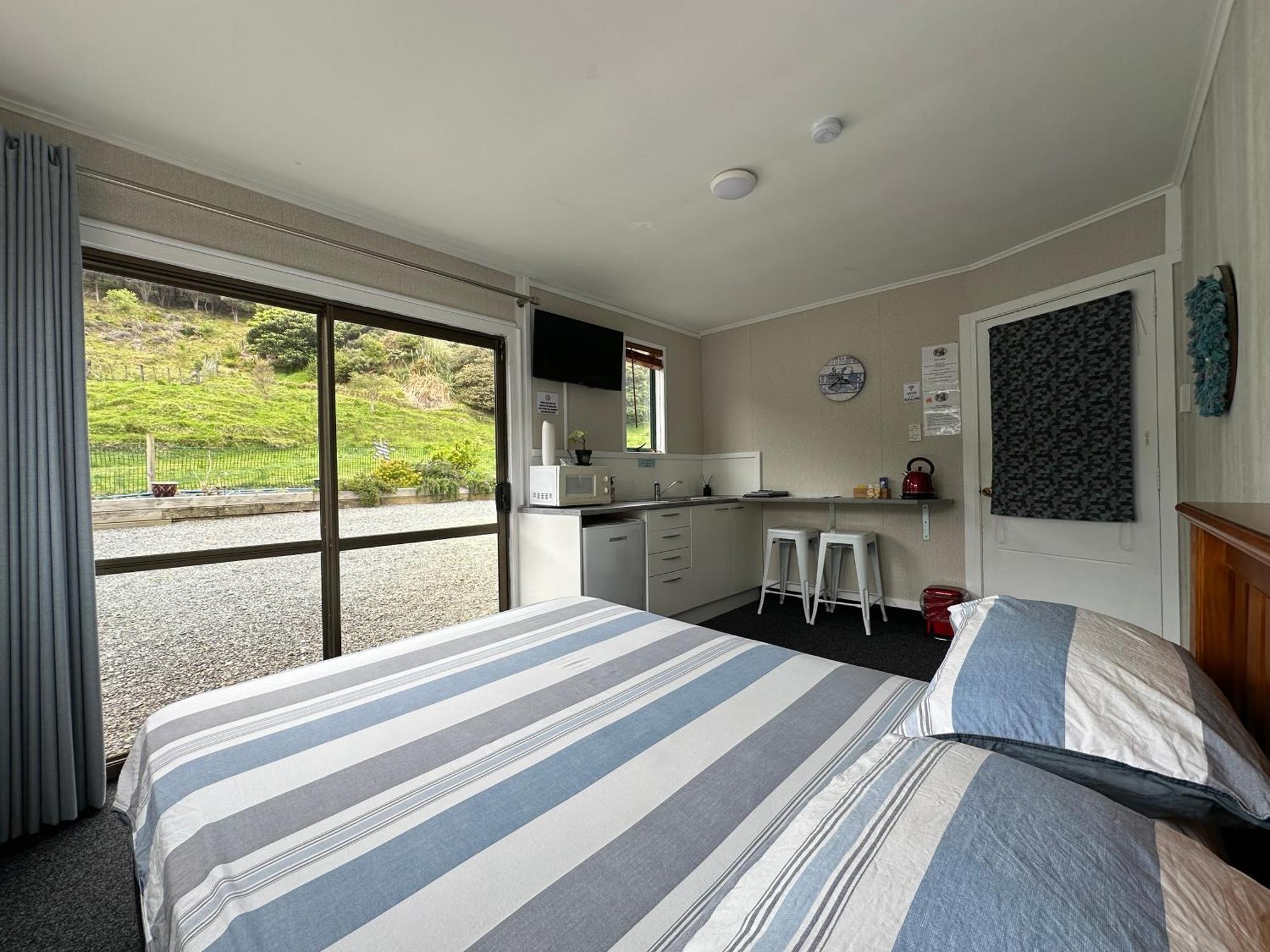 Kiwi Cabins Tapu Esterno foto